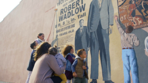 A mural of the world's tallest man