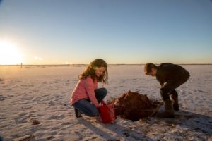 two children crystal digging at salt plains
